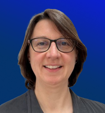 A head and shoulders image of Dr Jude Hayward with a blue background.