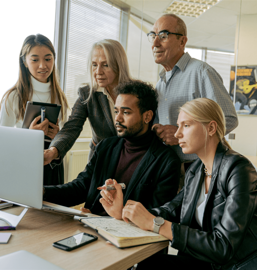 diverse people working at computer