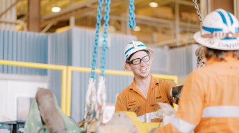 people talking on a mine site