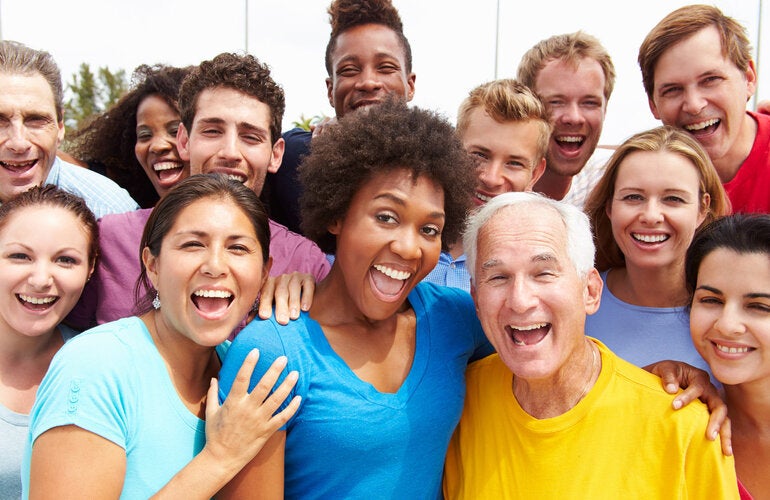 group of people smiling at the camera