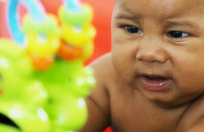 Infant with face mask 