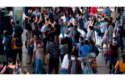 People in a bus station in Brazil