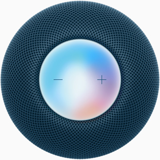 Un HomePod mini blu visto dall’alto con i controlli più e meno per alzare e abbassare il volume sulla superficie touch colorata.