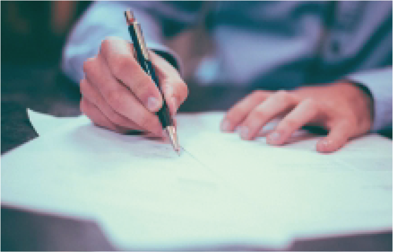 Man writing on papers