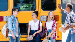 Students walking from school buses.