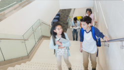 Students walking up stairway