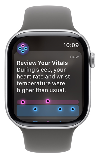 La pantalla de un Apple Watch muestra una notificación recomendando consultar los signos vitales