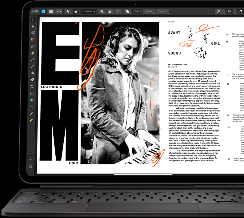 iPad Pro attached to Magic Keyboard in landscape orientation, displaying an article and being edited