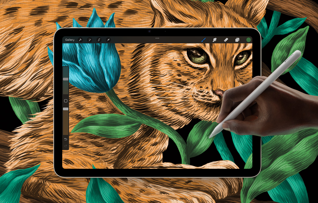 iPad Air menampilkan gambar Procreate yang membentang ke latar belakang.