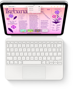 Felülnézeti kép az iPadről fehér Magic Keyboard Folióval.