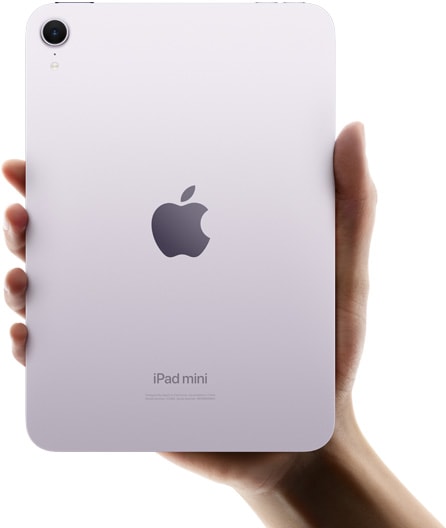 A user holding iPad mini, back facing, in one hand to show compact size and portability.