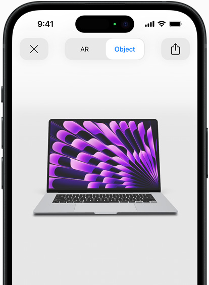 Preview of MacBook Air in Space Grey colour being viewed in AR experience on iPhone