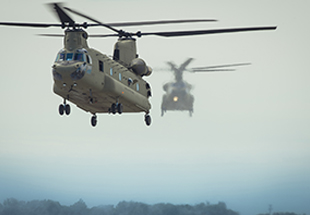 2 H-47 Chinooks in flight