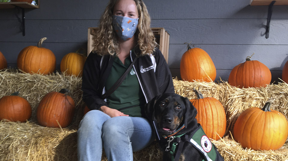 Summit Assistance Dogs trainer with service-dog-in-training, Leroy