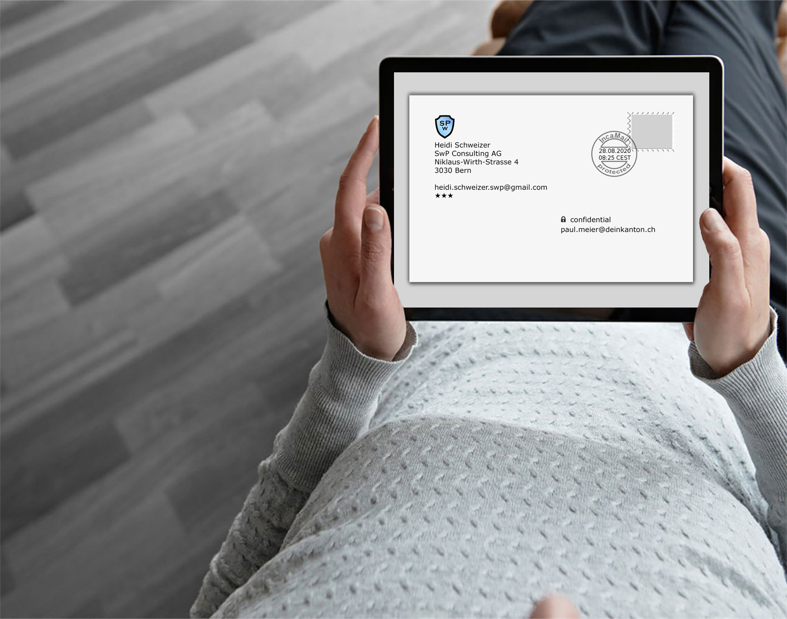 Background image of a woman handling an iPad which is connected to IncaMail.