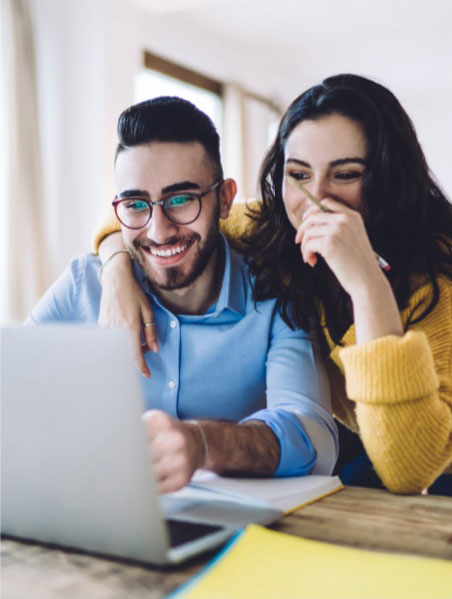 Couple using Laptop