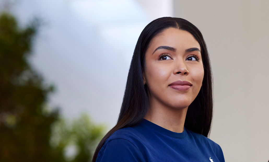 Close-up image of Carissa smiling and looking to the right.