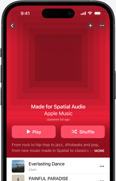 iPhone screen with Made for Spatial Audio playlist cover art in the Apple Music app