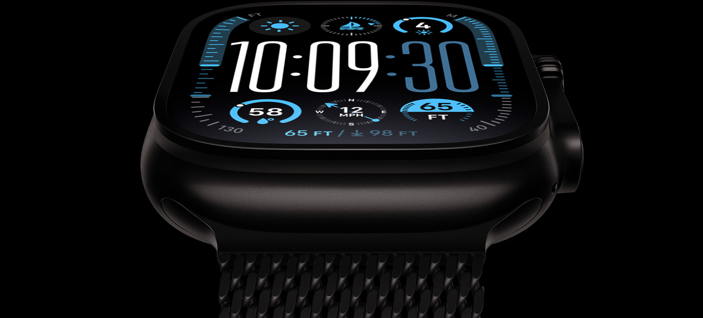 A close-up of a black titanium Apple Watch Ultra 2 with the display showing the time and other dynamic info.