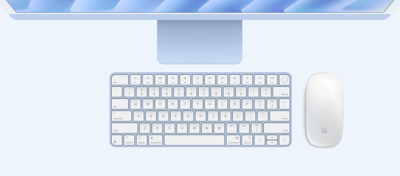 Overhead view of blue iMac with color-matching mouse and keyboard