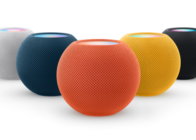 From left to right: one White, one Blue, one Orange, one Yellow and one Space Grey HomePod mini