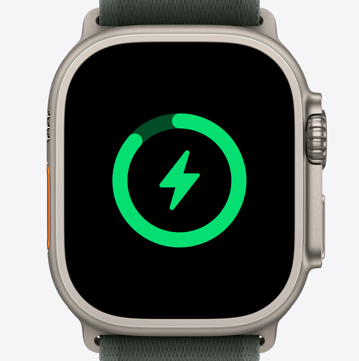 Et Apple Watch Ultra 2, der viser symbolet for batteriopladning.