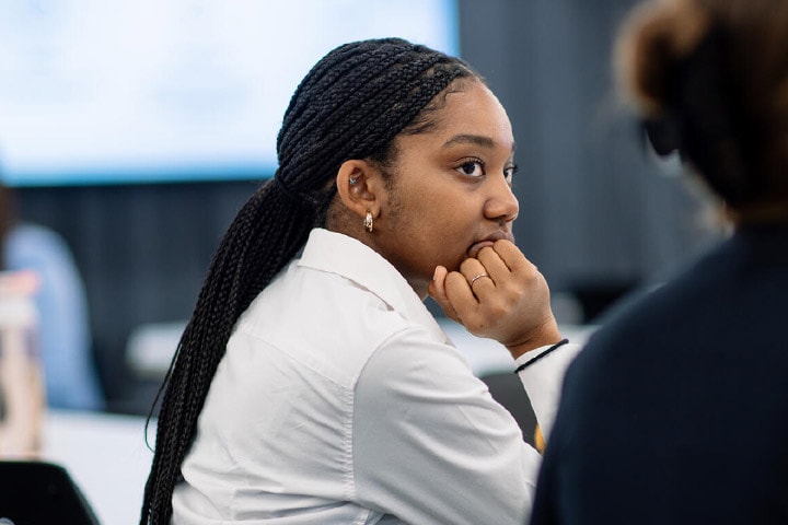 Medical student at Mayo Clinic Alix School of Medicine in a classroom.