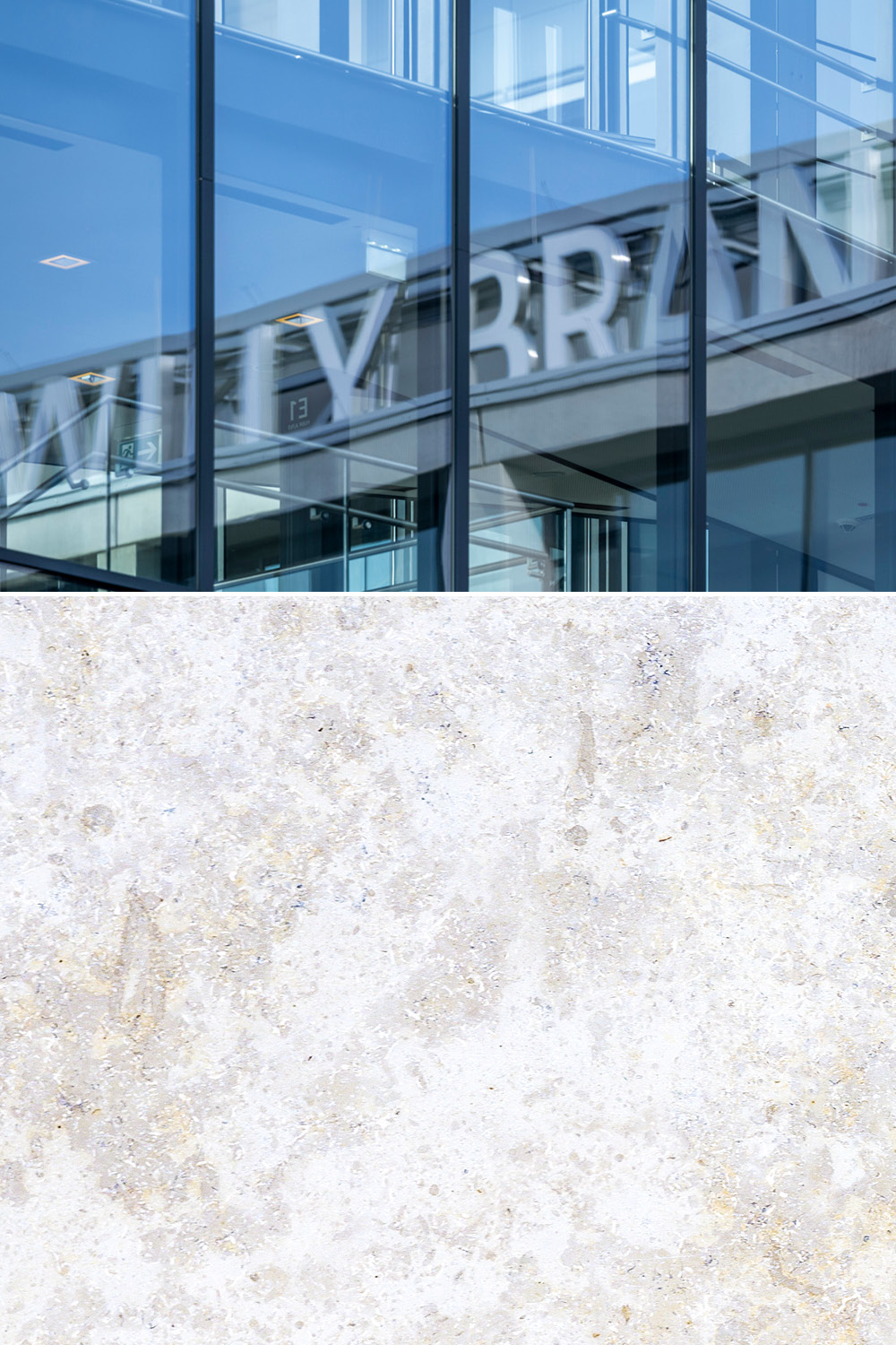 Reflection of Willy Brandt lettering on glass facade