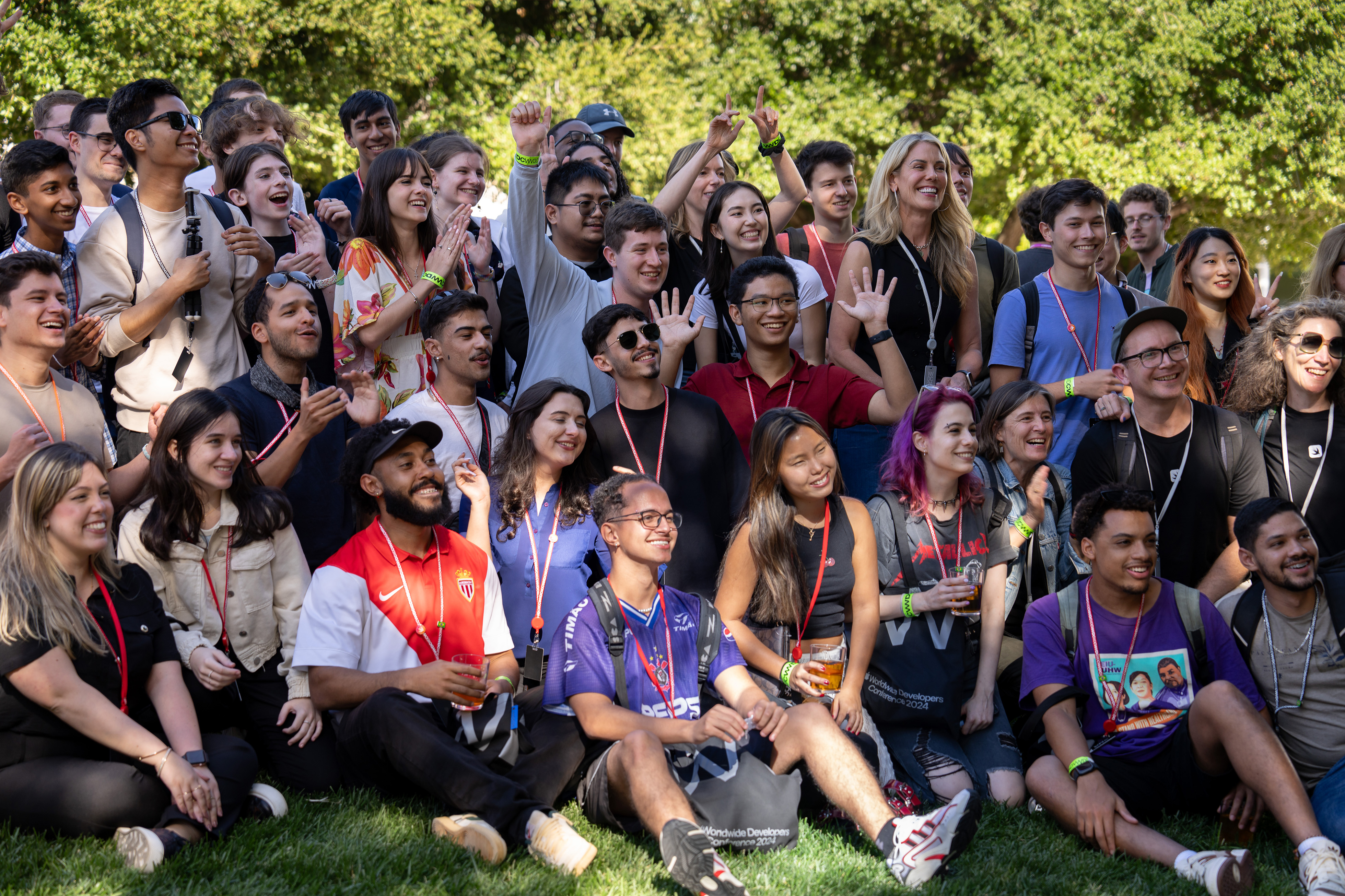 2024 Swift Student Challenge Winners posing outdoors at WWDC.