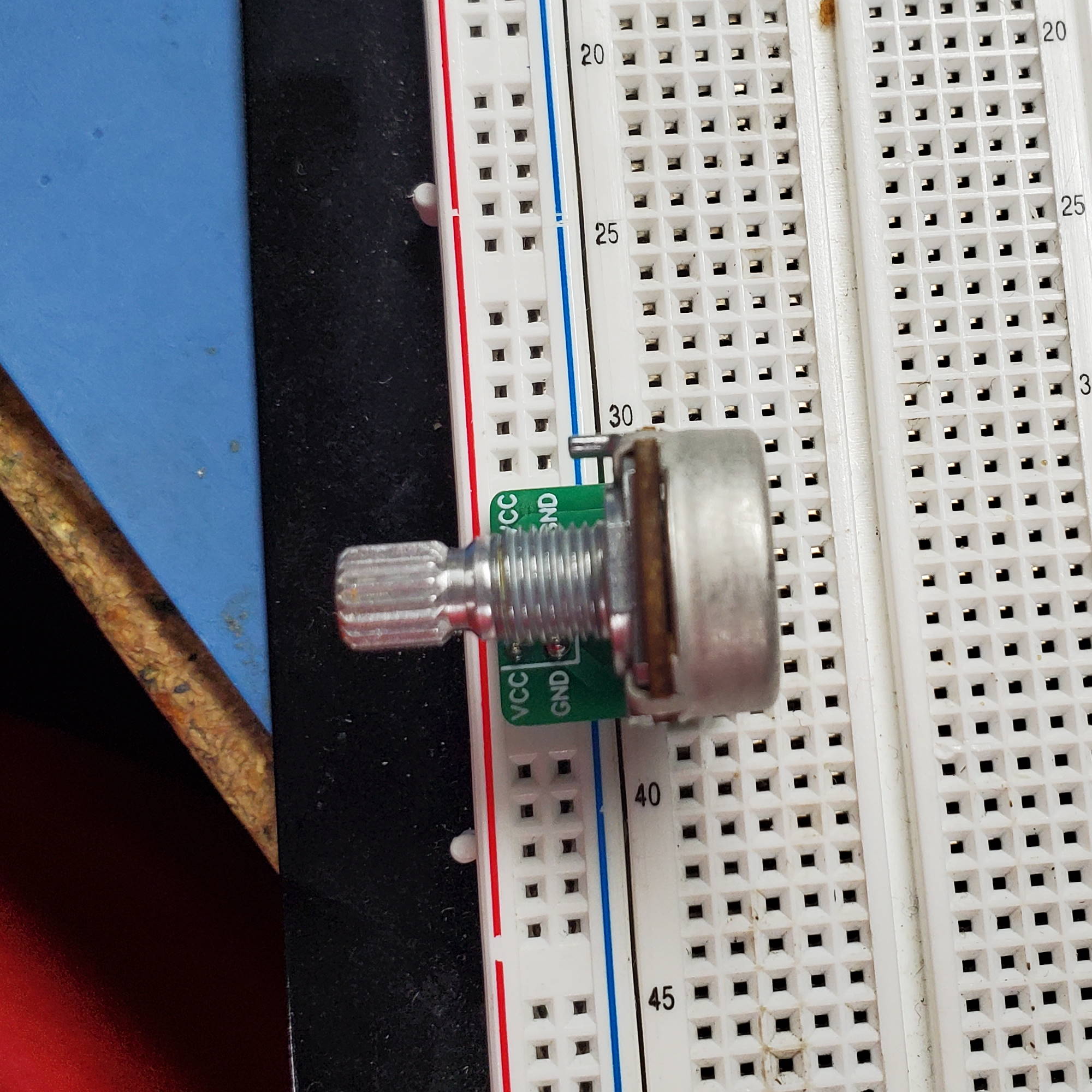 Photo of assembled board sitting in a breadboard