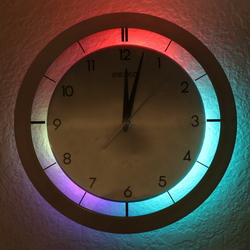 Forward facing glass clock with LED circle