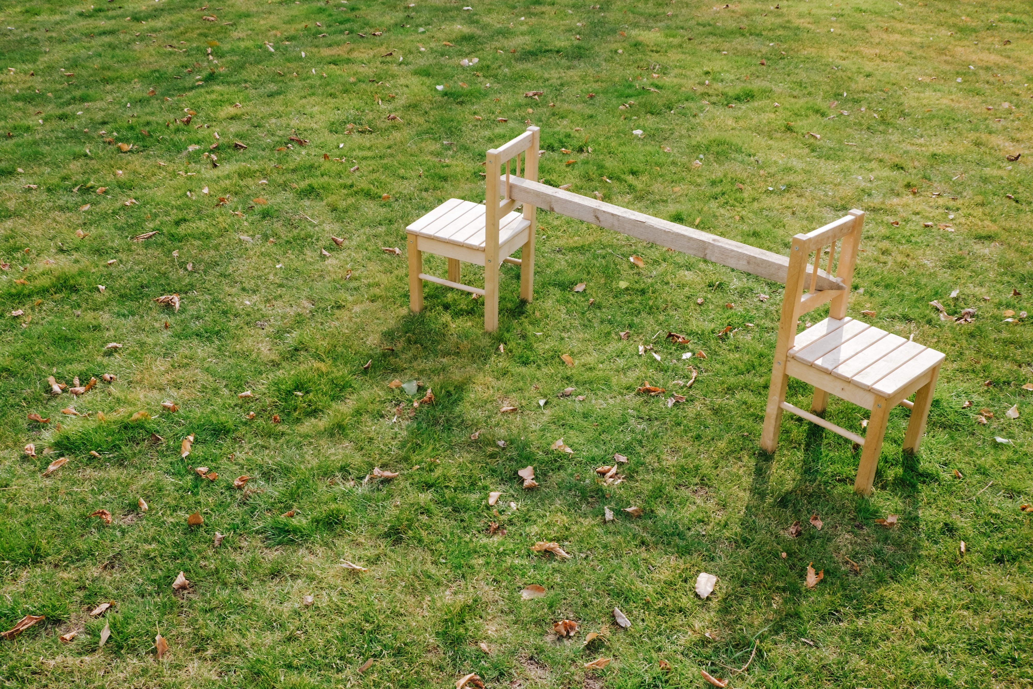 Chairs relying on each other. Image via Unsplash.