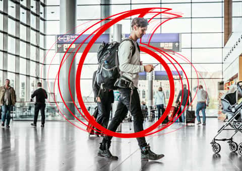 Man on phone in airport