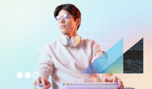 Man sitting at a computer with mouse and keyboard in hand