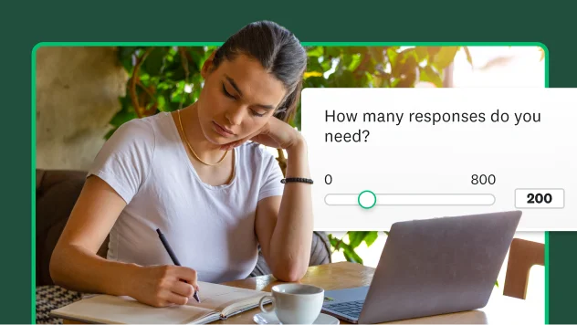 Woman writing in notebook next to screenshot showing question of how many survey responses needed