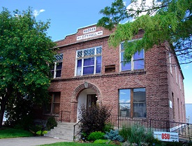 Madras City hall, a 2 story brick building.