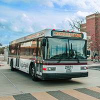 AggieSpirit bus on campus