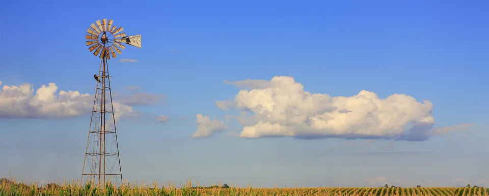 Old windmill in Iowa cornfield