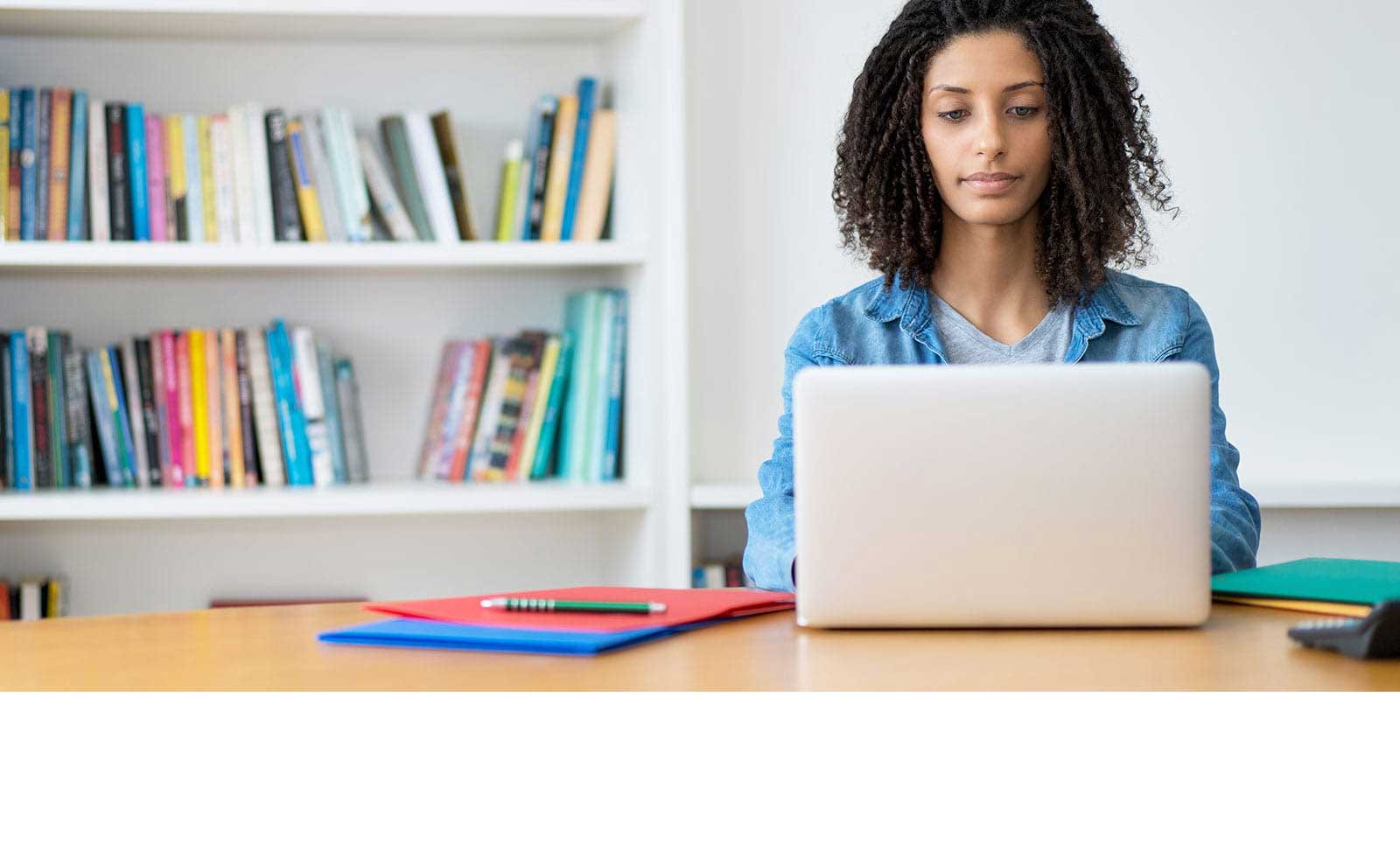 African American woman working on a laptop