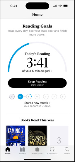 iPhone screen showing the Reading Goals interface in the Books app. At the top, there is a progress ring. Below the progress ring is the weekly reading streaktracker. At the bottom is the Books Read This Year section, which includes a row of two books, with an empty slot for a third