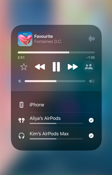 Screenshot of a song on Apple Music playing on two different sets of AirPods.