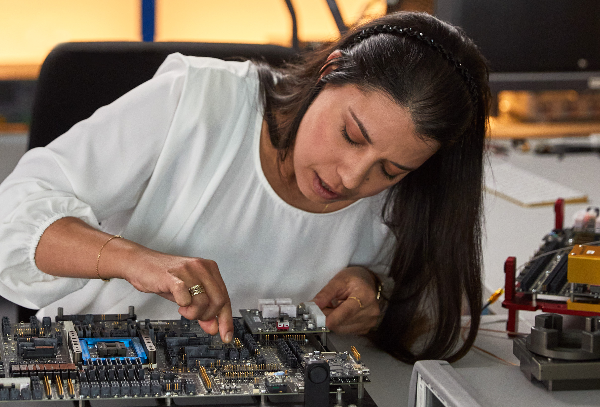 An Apple employee working in a silicon lab