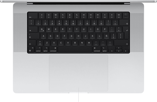 Vista desde arriba de una MacBook Pro de 16 pulgadas que muestra el trackpad Force Touch debajo del teclado