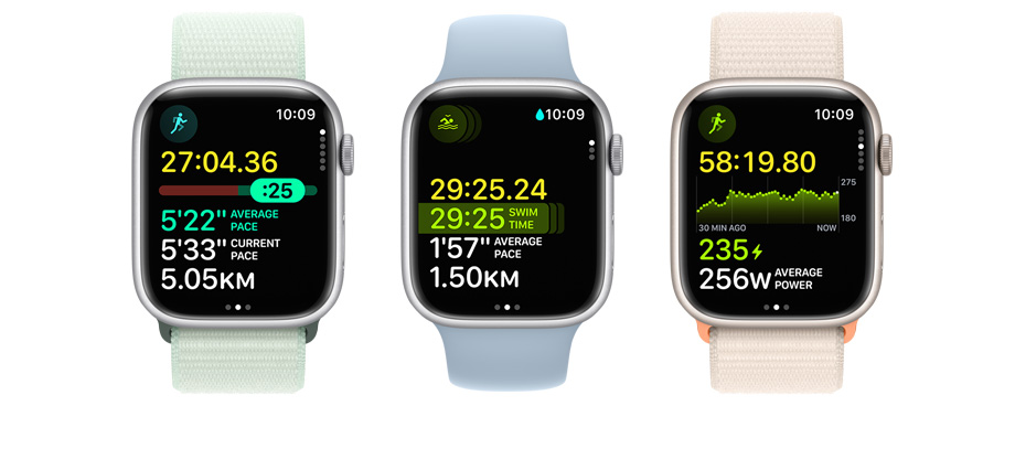 A picture of three Apple Watches. Each has different metrics and workout views on it.