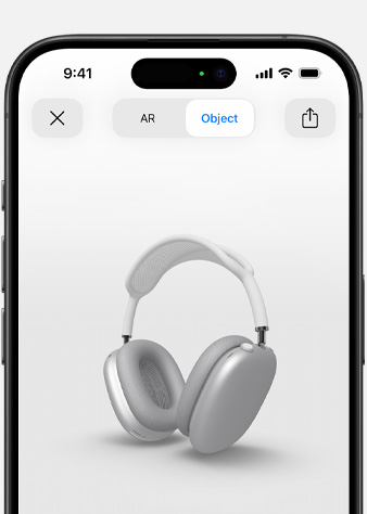 Pildil on iPhone'i ekraanil liitreaalsuses kuvatav hõbedane AirPods Max.