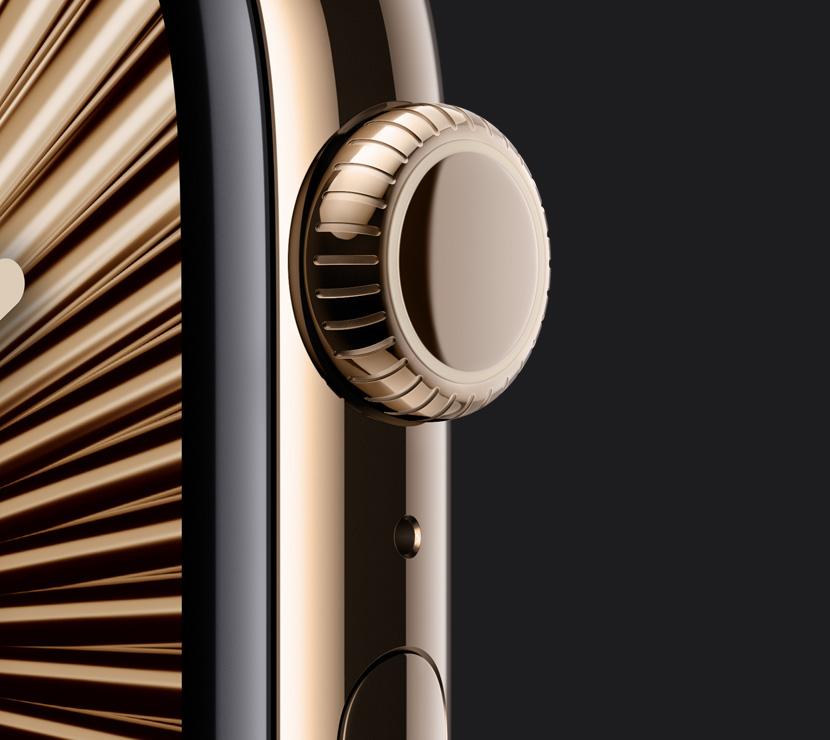 The Natural Titanium finish, Gold Titanium finish and Slate Titanium finish of three Apple Watch Series 10 cases with a close-up of the sides of their Digital Crowns. An interactive finish selector is below them.