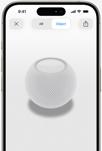 En HomePod i farven hvid vises i AR på en iPhone-skærm.