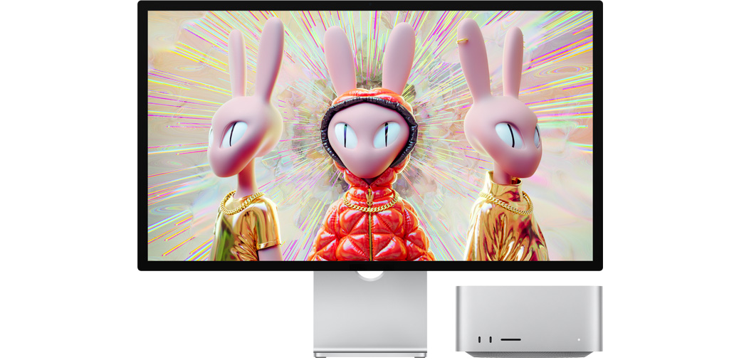 Mac Studio à côté d’un Studio Display affichant une image 3D de lapins humanoïdes.