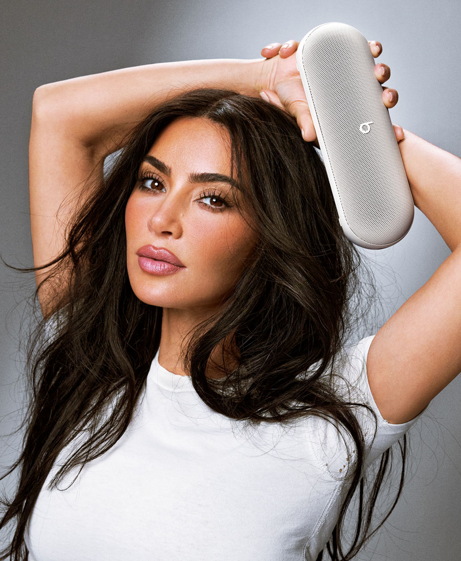 Kim Kardashian holding Beats Pill in Light Gray