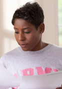 woman looking through papers